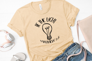 Free Be the light SVG is the perfect file to make a DIY Cricut project that is super easy DIY shirts are so much fun to make and so easy. Use this Free SVG to make shirts for the whole family #cricut #freesvg #svg #diy #silhouette