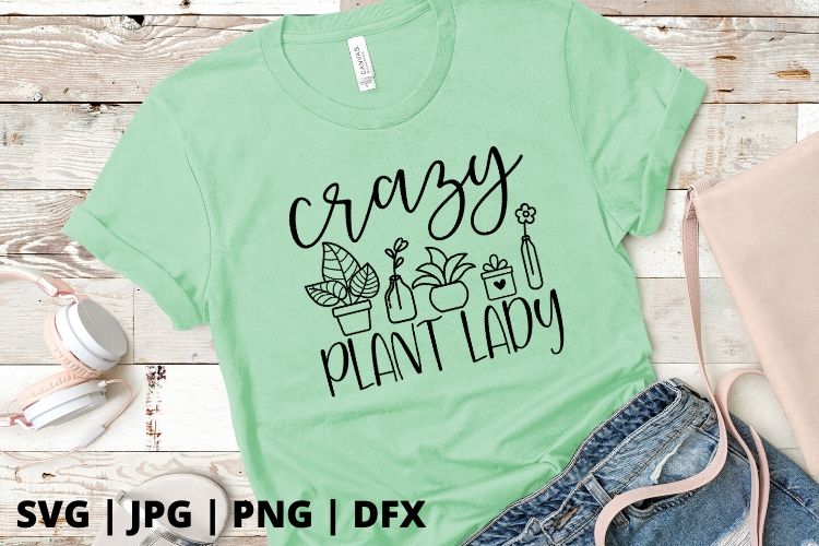 Free crazy plant lady SVG is perfect for the plant lover in your life. Plant ladies are a real thing y'all. share all the plant life love with this adorable free plant lady svg file and use it with oyur cricut for an amazing easy cricut project. put it on a mug, tee or even an outdoor pillow. #svg #freesvg #plant #plantsvg #cricut #silhouette