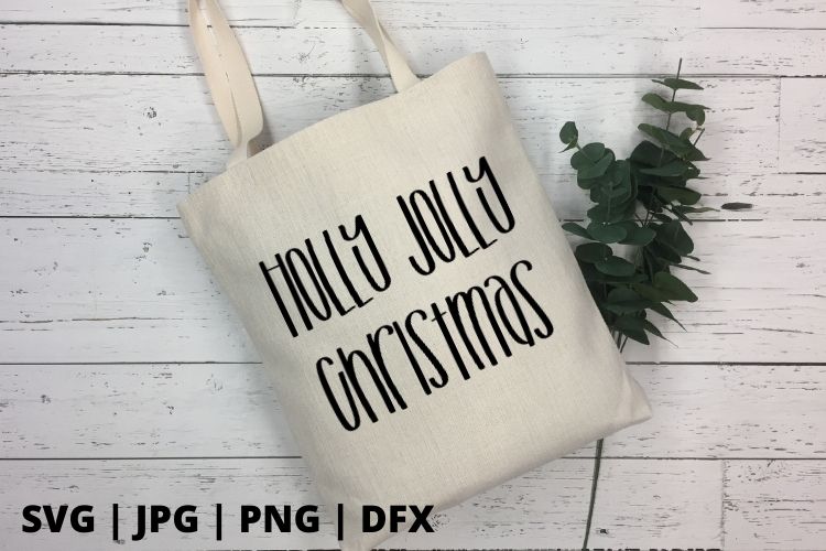 Free Holly Jolly Christmas SVG is perfect for amping up your Christmas spirit y'all. Add this adorable Christmas cut file to a tee, bag or cup and share your spirit. #svg #freecutfile #cricut #cricutmade #silhouette #christmassvg